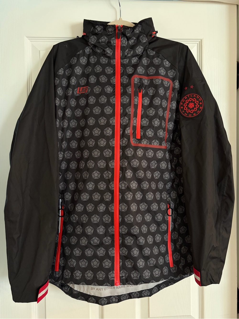Portland Thorns Soccer Team Raincoat with Red Trim and Graphic Pattern